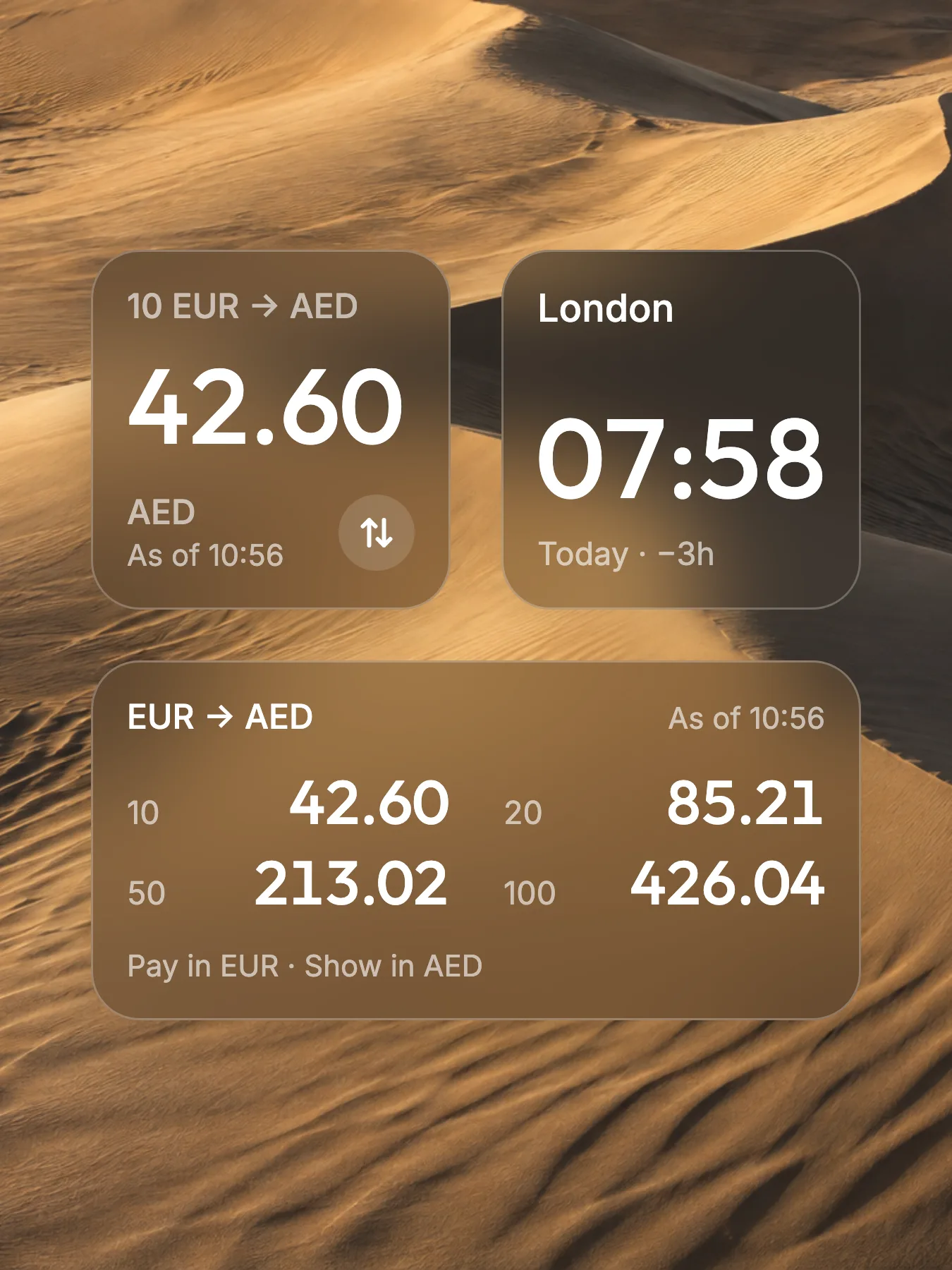 JustConvert Rate, World clock, and Price guide widgets on a Home Screen